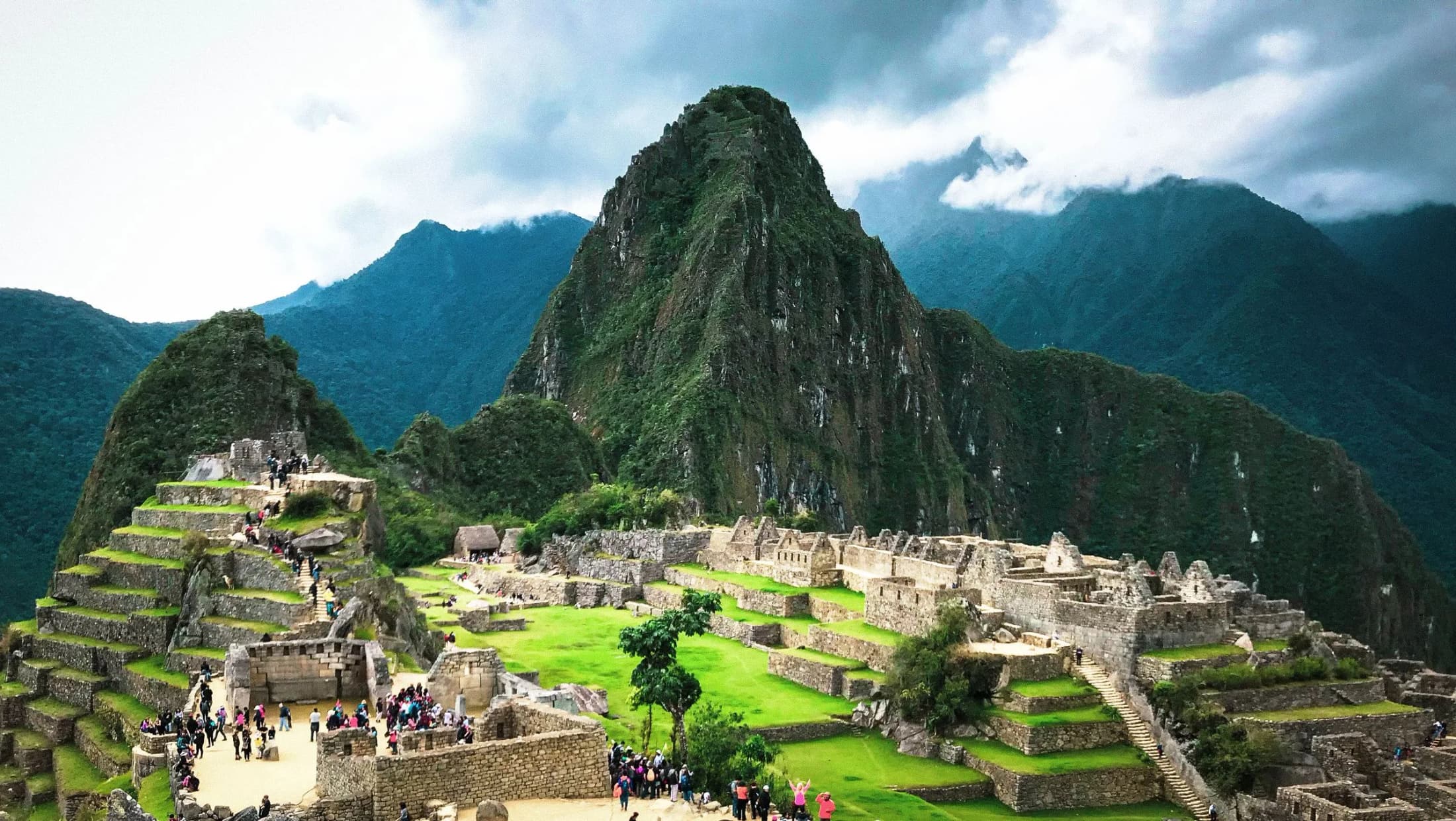 The ruins of Machu Picchu beneath Huayna Picchu in the Peruvian Andes